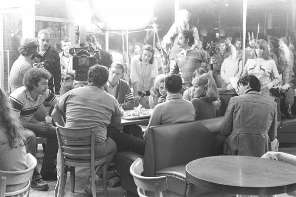 L-R Belushi with his back to us. TIm Matheson, Mary Louise Weller and John Landis. Across from Belushi, James Daughton. Courtesy of Katherine Wilson.