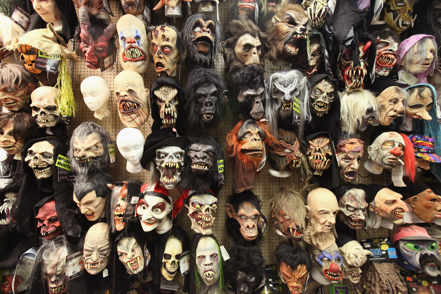 CHICAGO, IL - OCTOBER 28: Halloween masks are offered for sale at Fantasy Costumes on October 28, 2011 in Chicago, Illinois. The store, which had long lines at the registers at 4 AM this morning, is open around the clock through Halloween to help keep up with customer demand. Retailers nationwide are expecting record sales for Halloween merchandise this year with shoppers spending close to $7 billion dollars to celebrate the holiday. (Photo by Scott Olson/Getty Images)