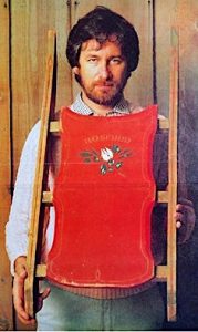 Steven Spielberg holds his Rosebud Sled.